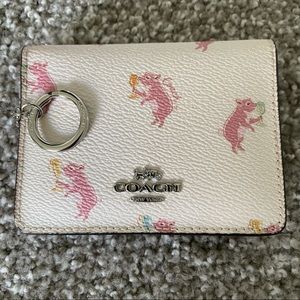 Coach “party animal” Wallet with keychain.